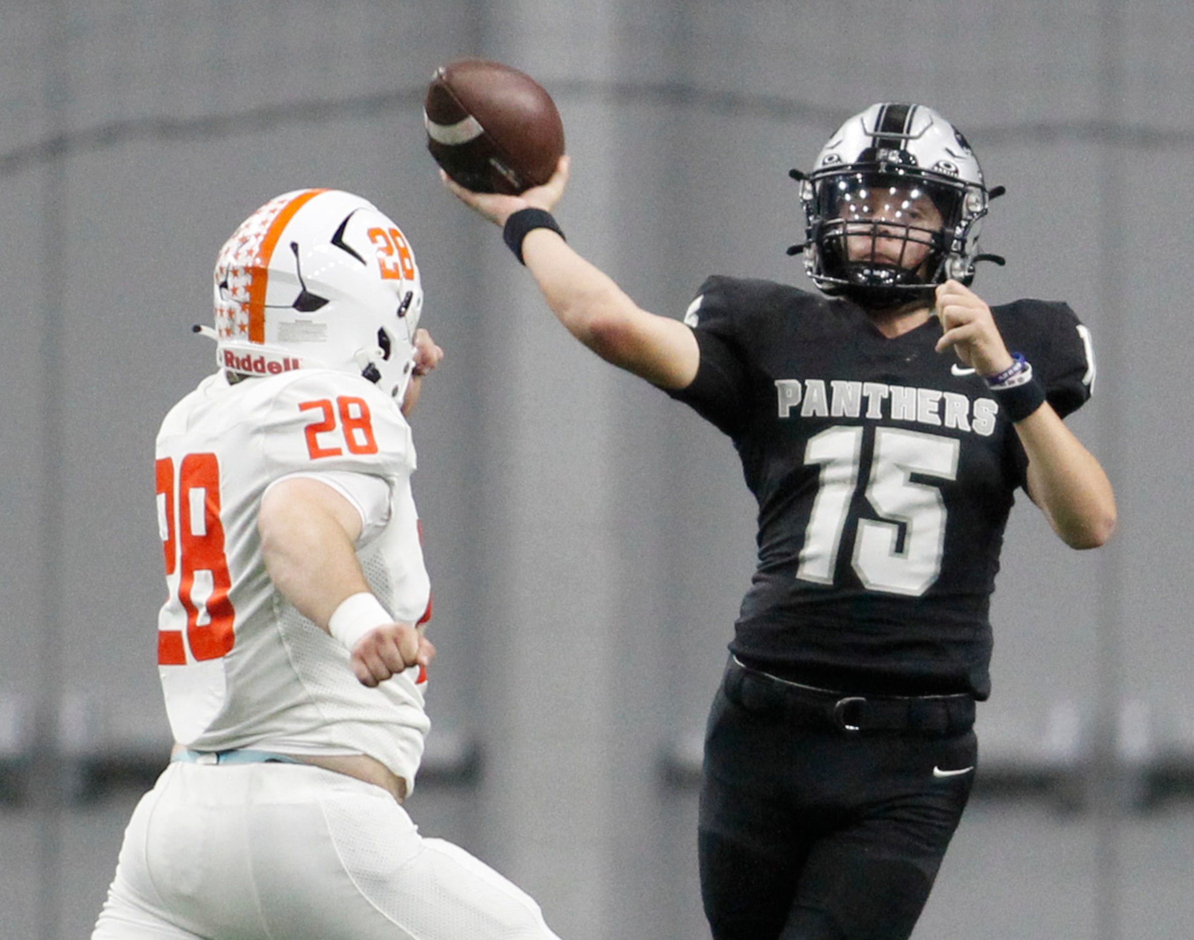 Frisco panther creek quarterback Graylyn Fry (15), right, launches a pass downfield as...