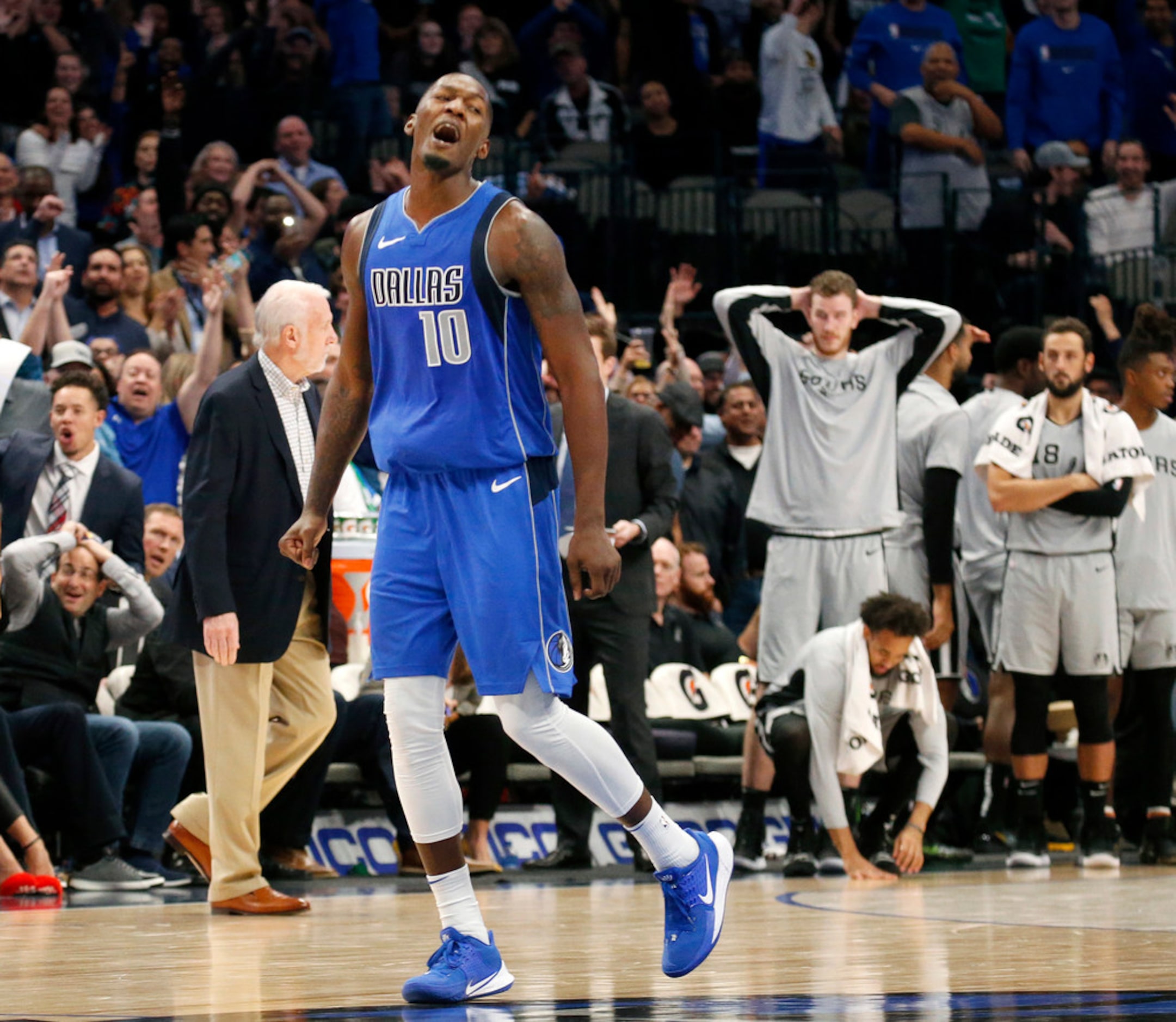 Late in the fourth quarter, Dallas Mavericks forward Dorian Finney-Smith (10) reacts after...