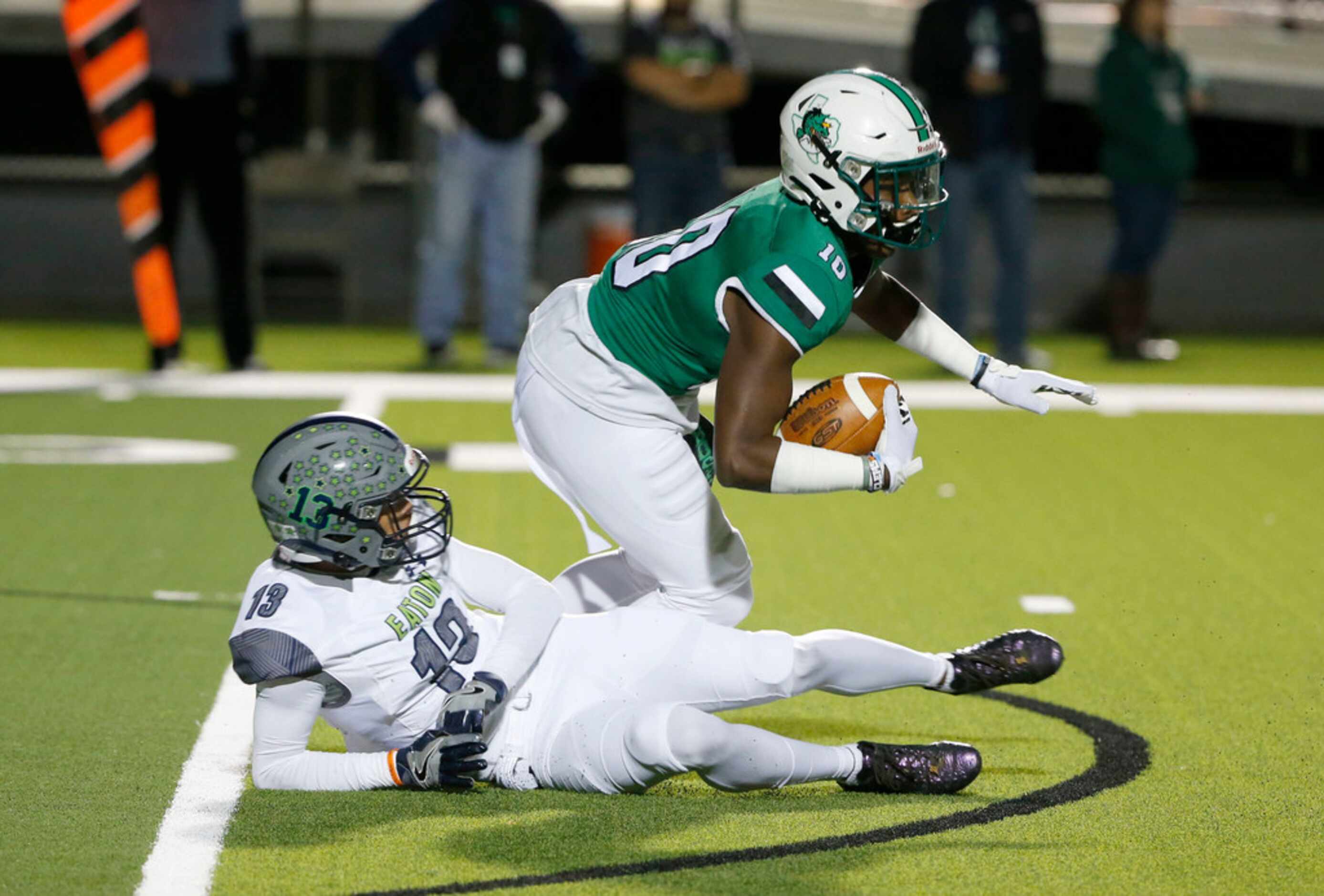 Southlake Carroll's JR Mickens (10) intercepts a a pass intended for Eaton's Max McCuiston...