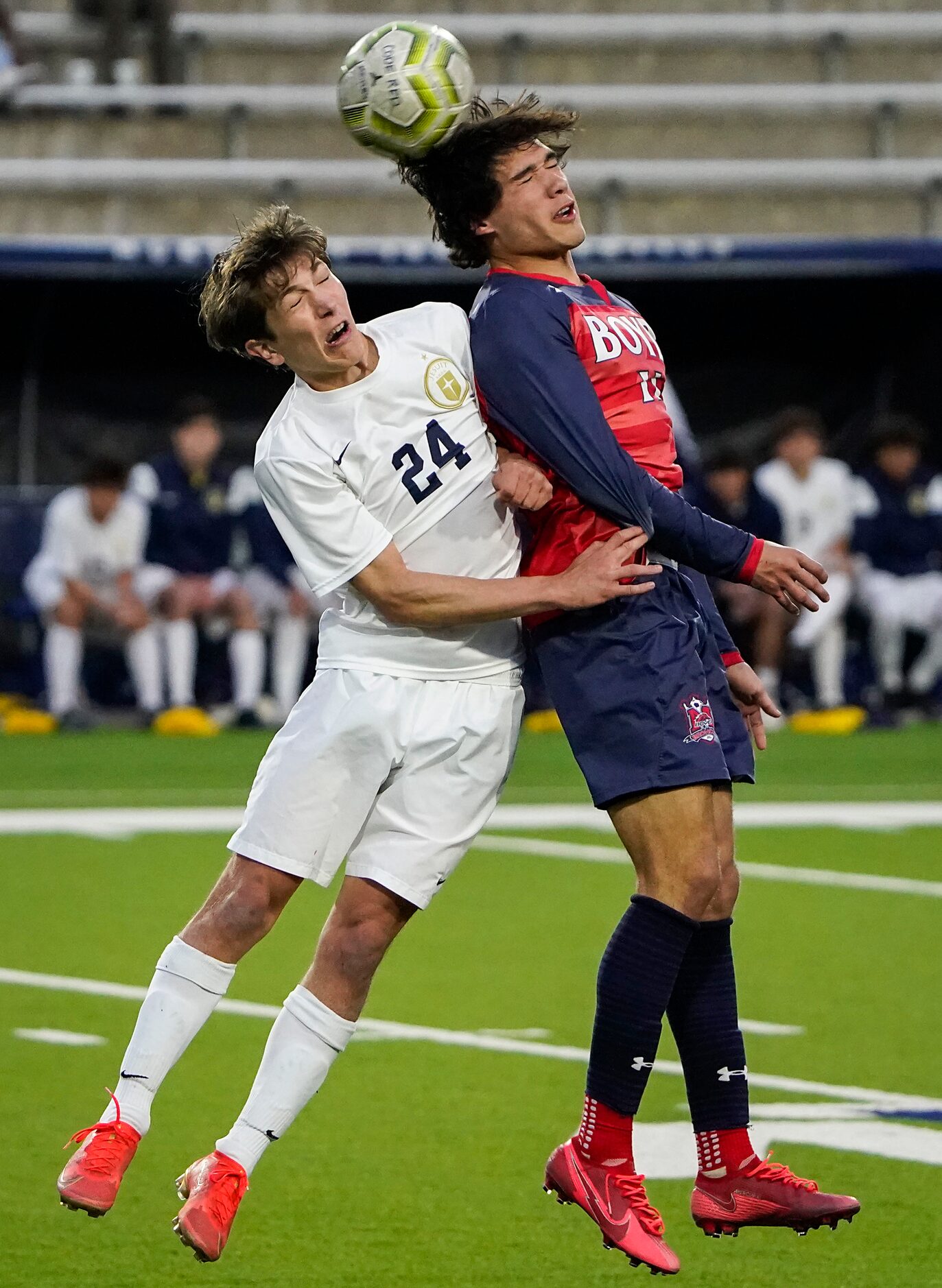 McKinney Boyd forward Jonathan Marquez (11) heads the ball over Jesuit defender Reid...