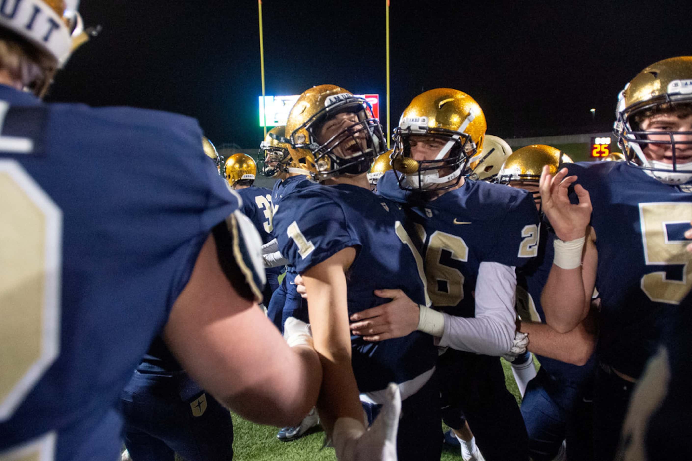 Jesuit senior wide receivers Christian Allocco (1) and Garrett Brockwell (26) celebrate as...