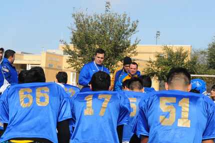Autenticos Tigres players listen to their coaches after a practice at UT-Arlington earlier...
