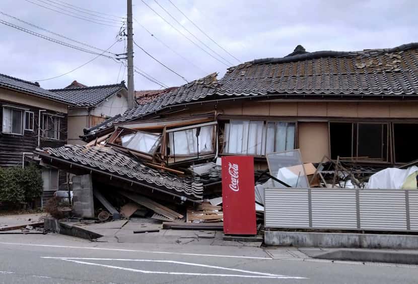 A house is damaged by an earthquake in Wajima, Ishikawa prefecture, Japan Monday, Jan. 1,...