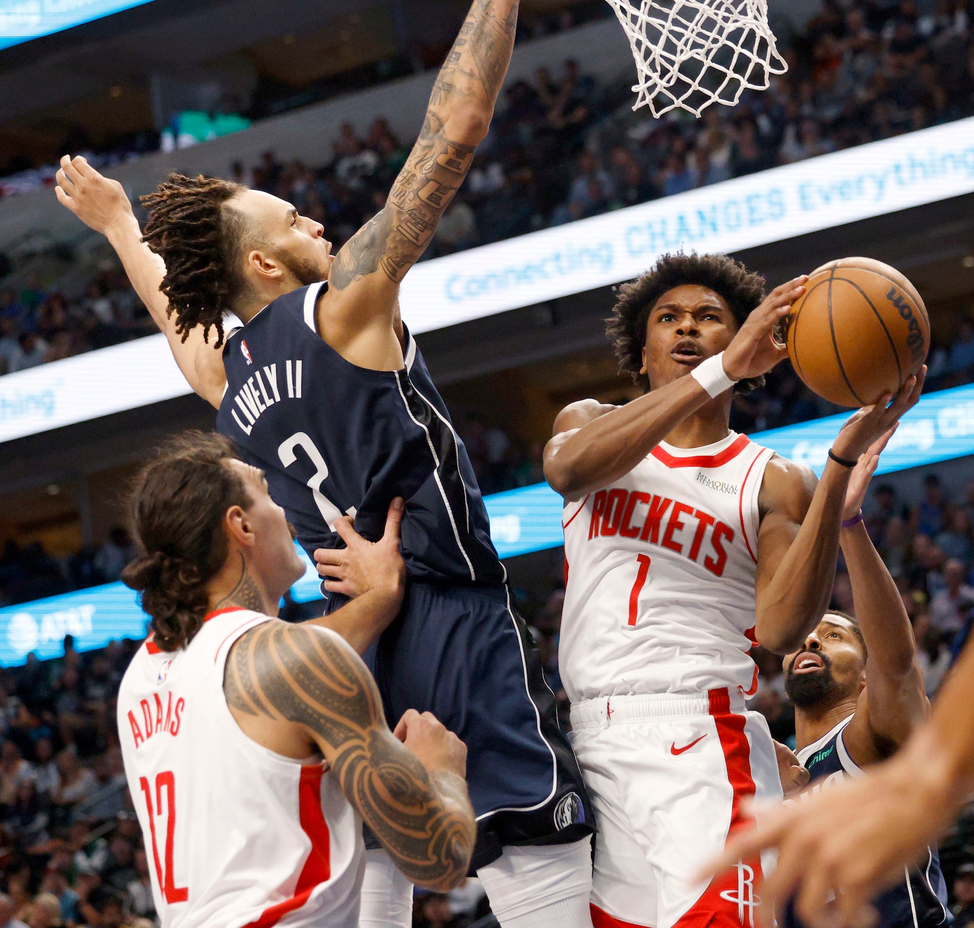 Dallas Mavericks center Dereck Lively II (2) tries to stop Houston Rockets forward Amen...