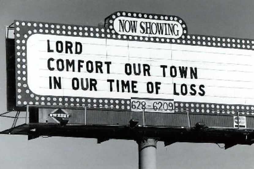 A billboard offers a prayer for comfort the day after the massacre at a Killeen cafeteria in...