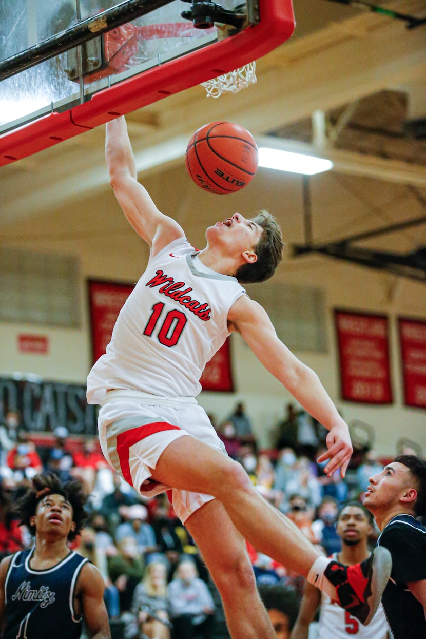 Lake Highlands senior forward Mohamad Shamait (10) dunks during a high school basketball...