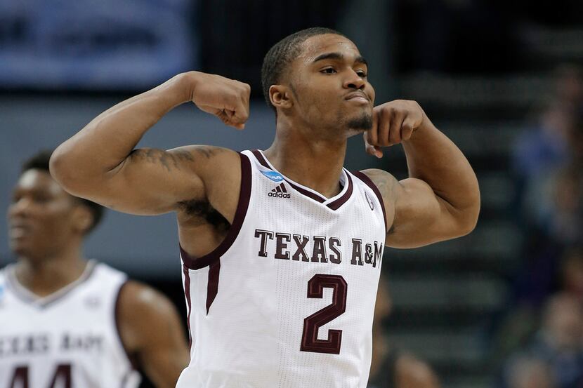 Texas A&M's TJ Starks (2) celebrates after a basket against Providence during the second...
