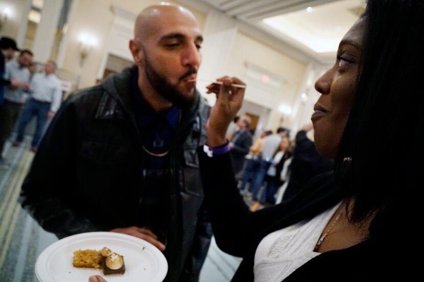 Karim Georgy and Jackie Jones share a pork sample at Cochon555. You can pig out all you want...