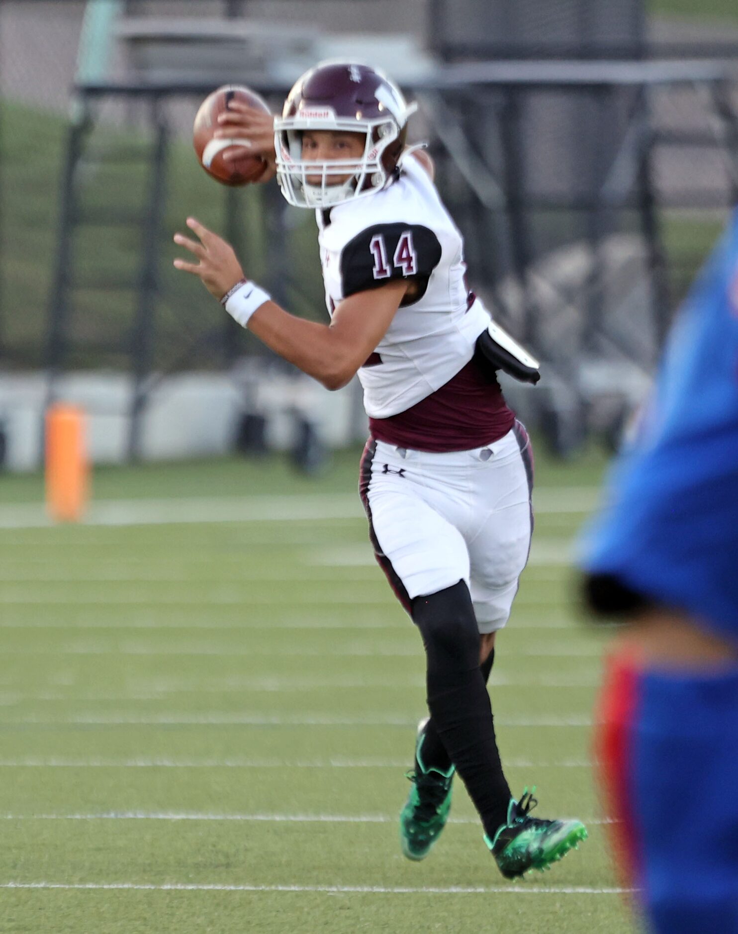 Wylie High QB Jagger Bale (14) prepares to throw a.pass during the first half of a high...