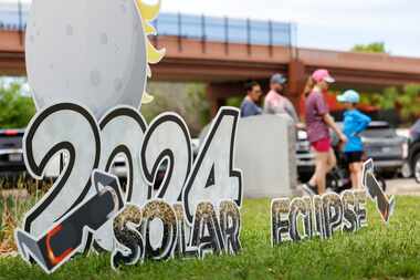 Solar Eclipse yard sign in downtown  Waxahachie on Sunday, April 7, 2024. 