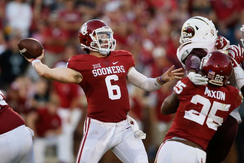 Oklahoma quarterback Baker Mayfield (6) throws in the second quarter of an NCAA college...