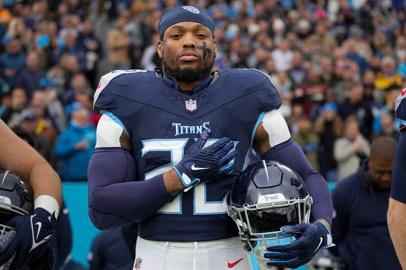 Tennessee Titans running back Derrick Henry stands for the national anthem before an NFL...