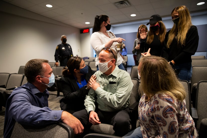 Fort Worth Police Department detectives Jay Bennett (left) and Leah Wagner spoke with Jim...