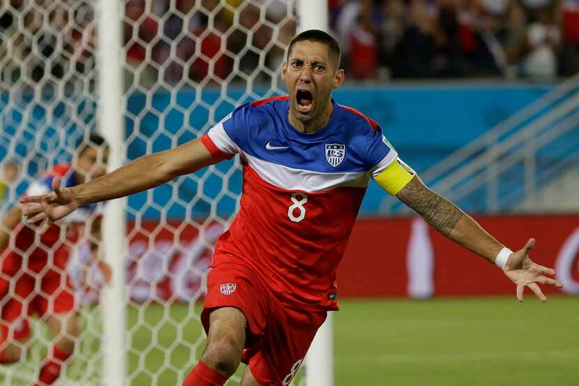 FILE - In this June 16, 2014, file photo, United States' Clint Dempsey celebrates after...