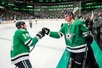 Dallas Stars left wing Jamie Benn (14) celebrates with left wing Mason Marchment (27) after...