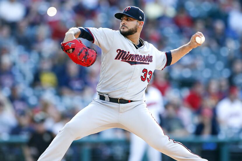 CLEVELAND, OH - JUNE 05: Starting pitcher Martin Perez #33 of the Minnesota Twins pitches...