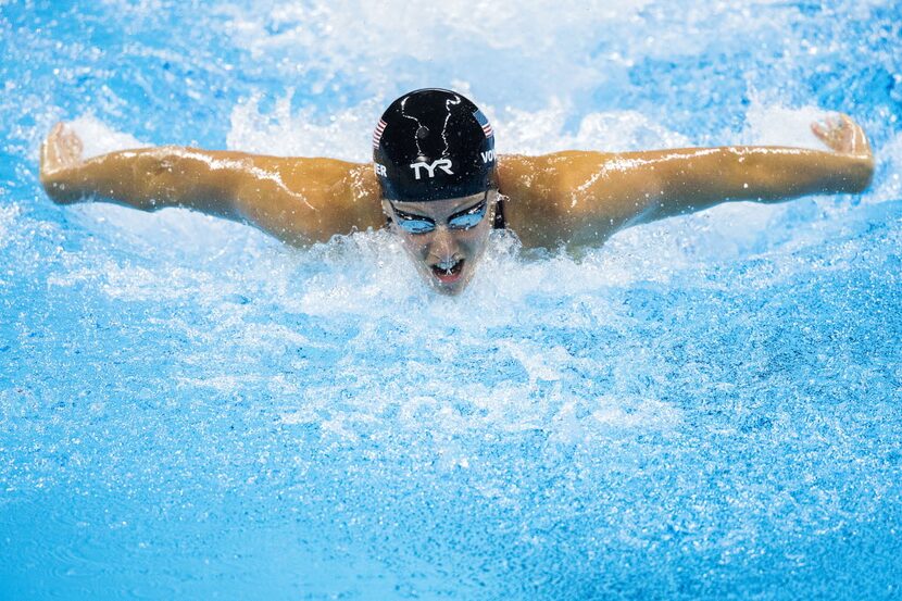 Dana Vollmer of the United States swims to a bronze medal in the women's 100m butterfly...