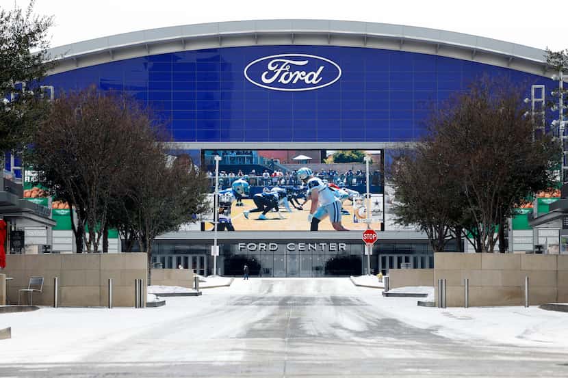 Snow covers the ground outside the Ford Center, Monday, Jan. 15, 2024, in Frisco, Texas....