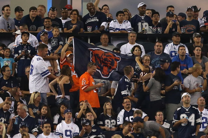 Fans of the Chicago Bears support their team against the Dallas Cowboys at Cowboys Stadium...