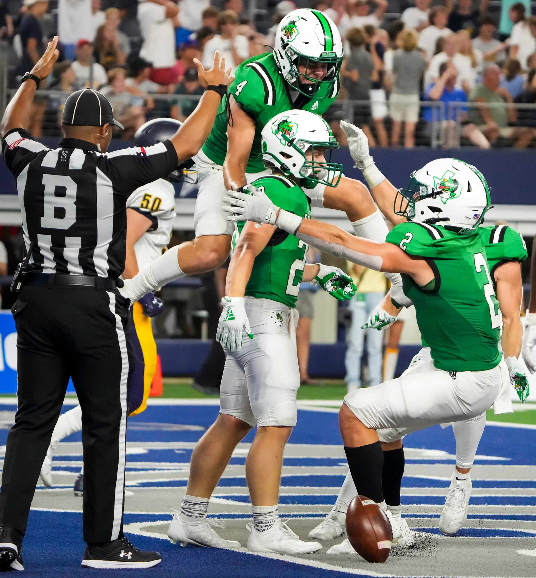 Southlake Carroll running back James Lehman (20) celebrates with wide receiver Owen Ohser...