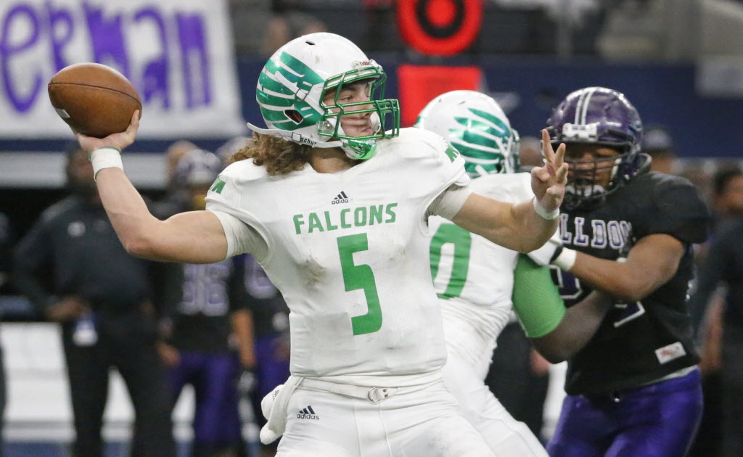 Lake Dallas quarterback Dagan Haehn (5) throws a second-quarter pass during the Lake Dallas...