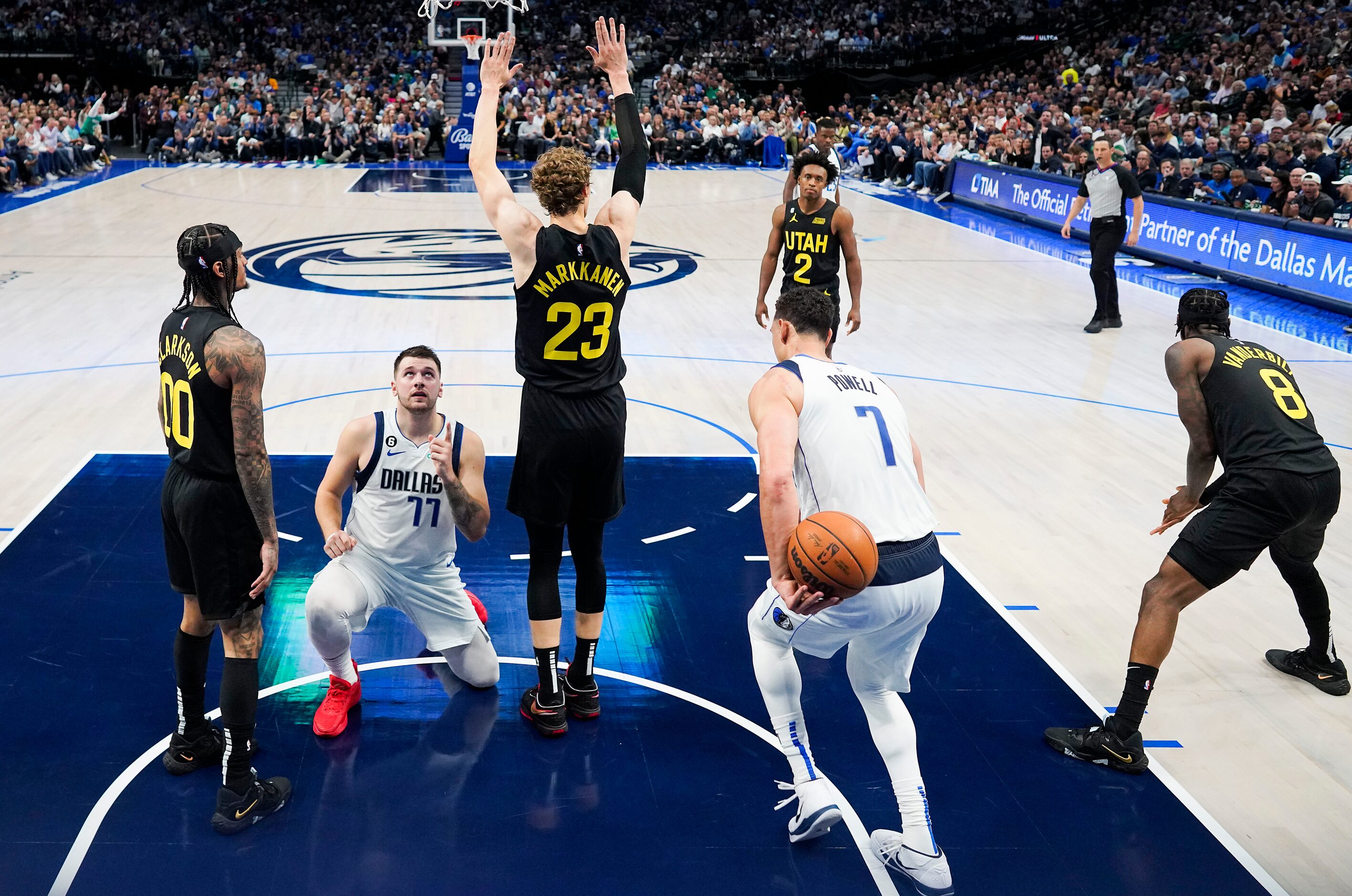 Dallas Mavericks guard Luka Doncic (77) reacts after being fouled by Utah Jazz forward Lauri...