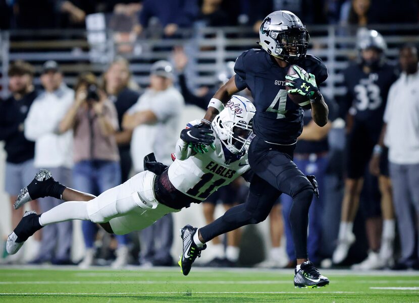 Allen defensive back Jeremiah Dillard (11) makes an attempt to tackle Denton Guyer receiver...