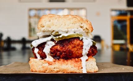 The Hot Hot Chicken at the Biscuit Bar is a Nashville-style hot chicken sandwich on a...