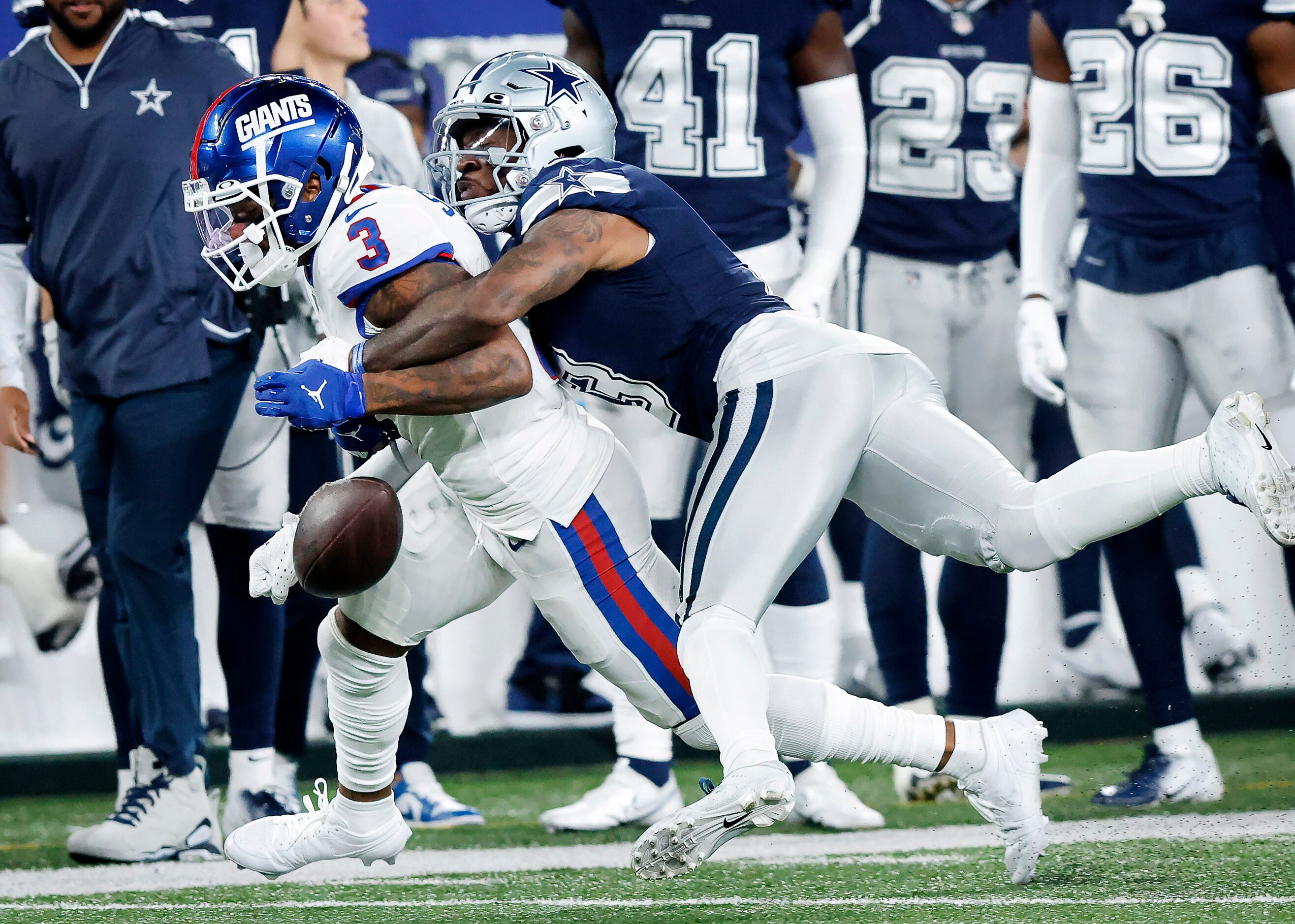 Dallas Cowboys cornerback Anthony Brown (3) breaks up a pass nearly caught by New York...