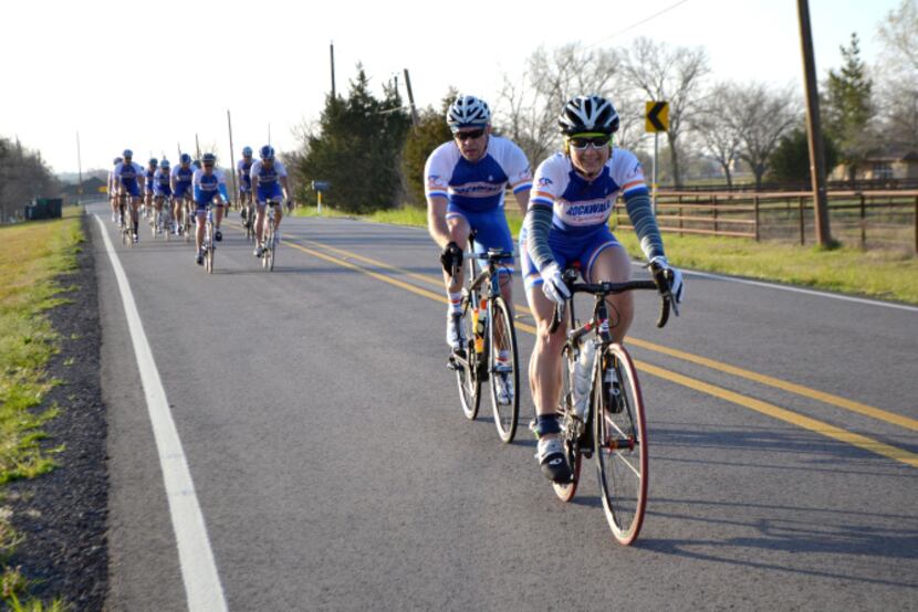 A group from the Rockwall Cycling shop rides on Farm Road 550 in McLendon-Chisholm on...