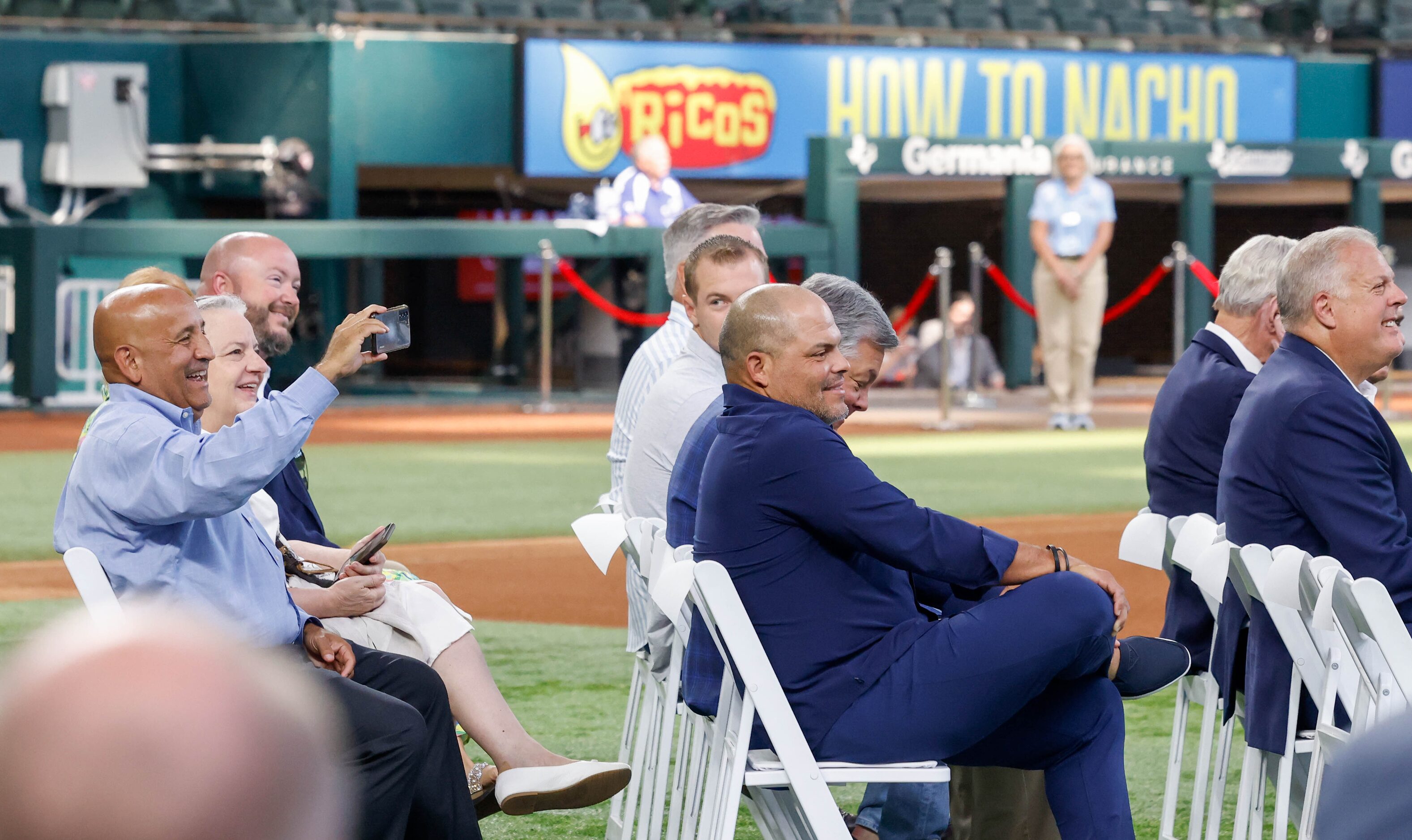 City of Arlington council member Raul H. Gonzalez (left) smiles after being recognized by...