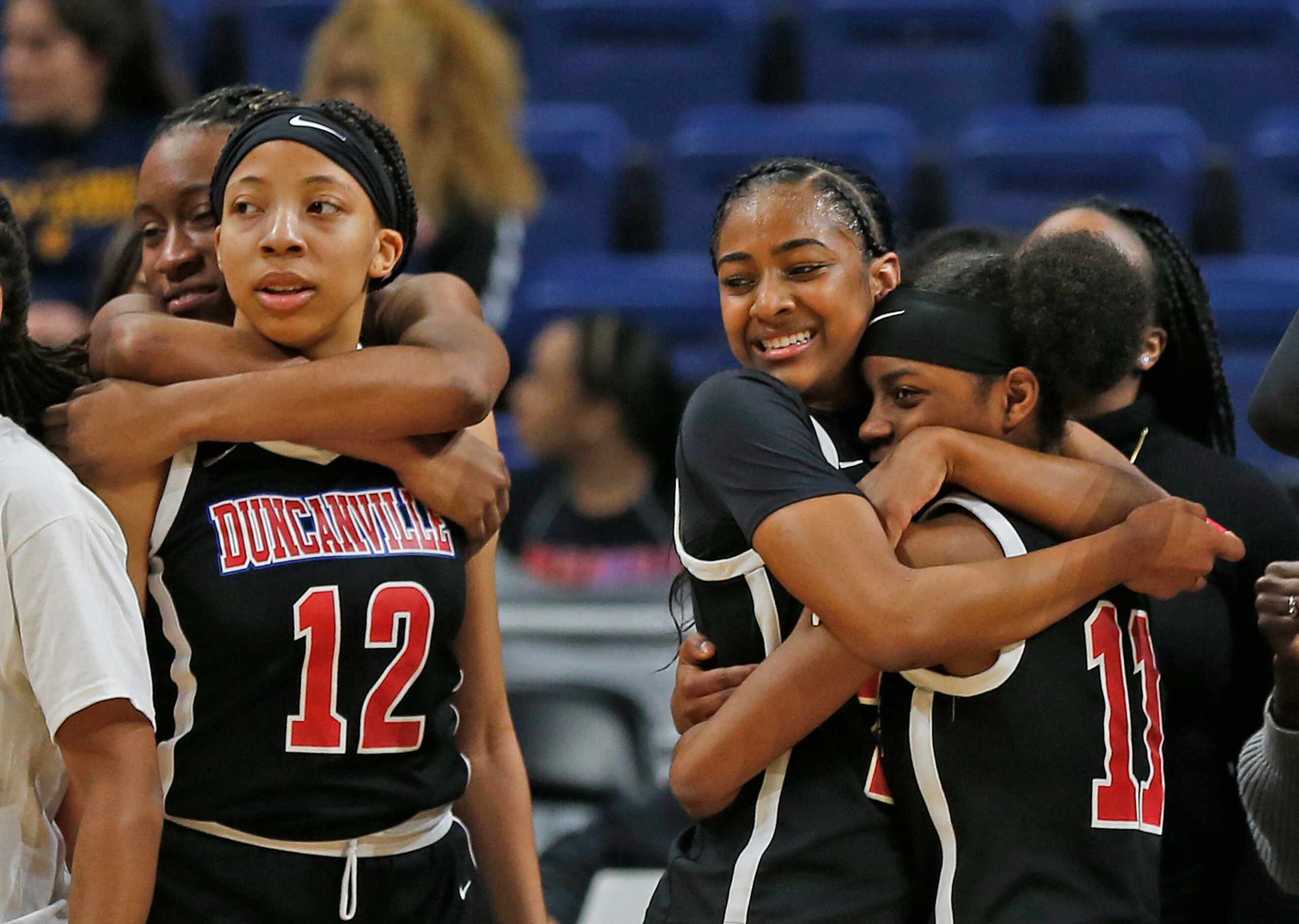 Duncanville celebrates on the bench in closing seconds in a 6A final on  Saturday, March 7,...