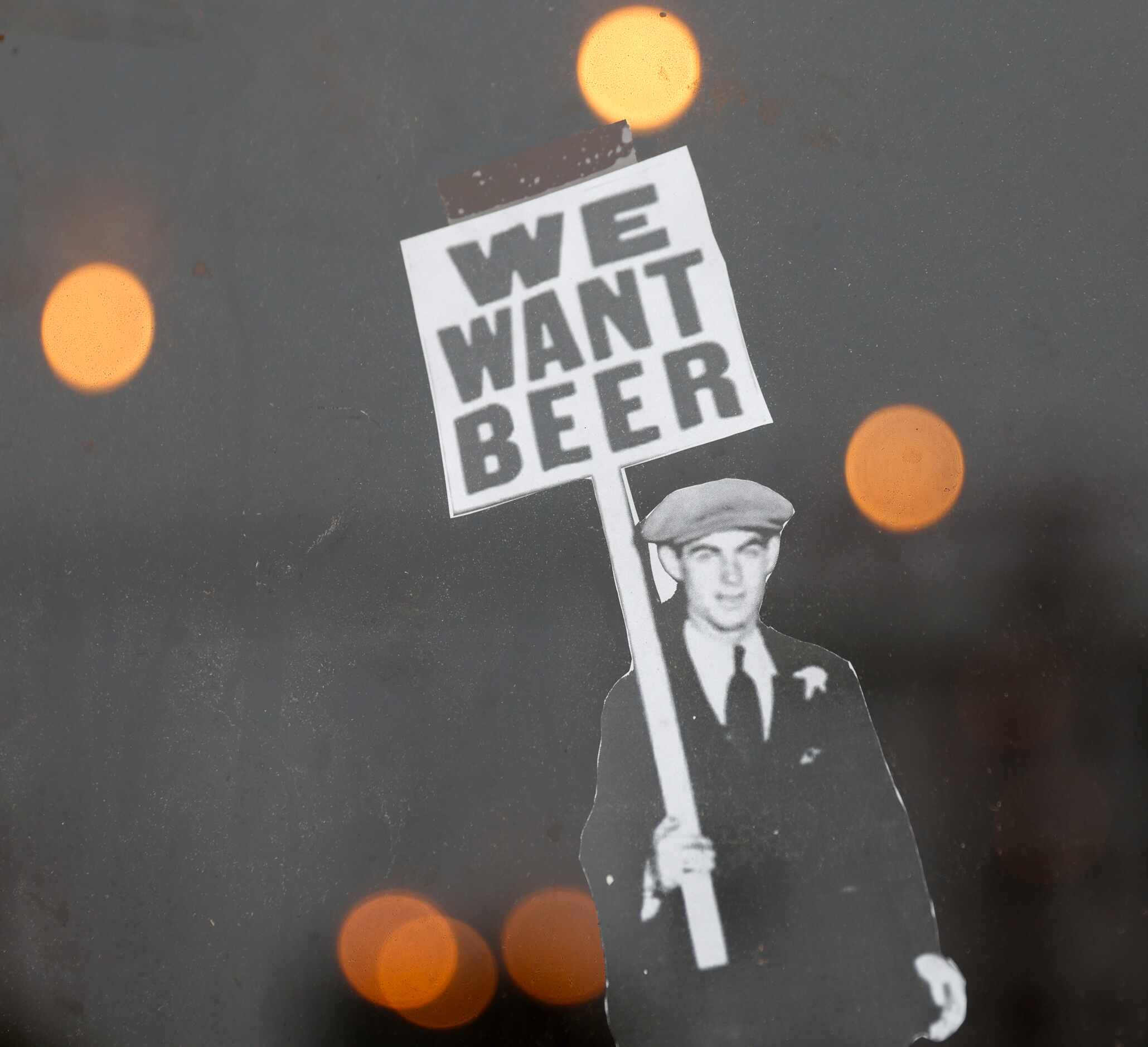 One of the signs reading We Want Beer, remains on the exterior window of Jaquval, Brewing...