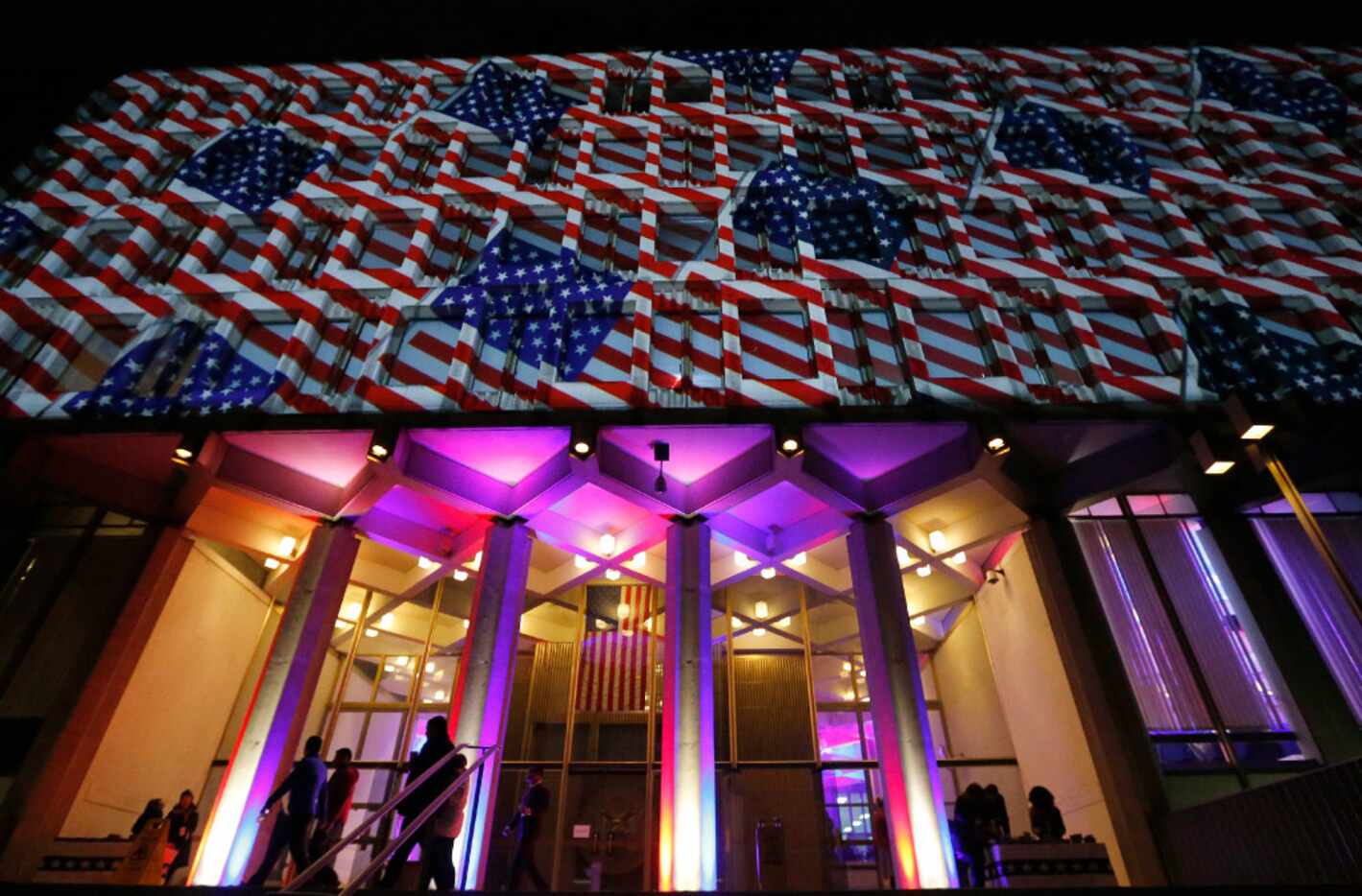 The United States Embassy is illuminated with Stars and Stripes for an Election Night Party...