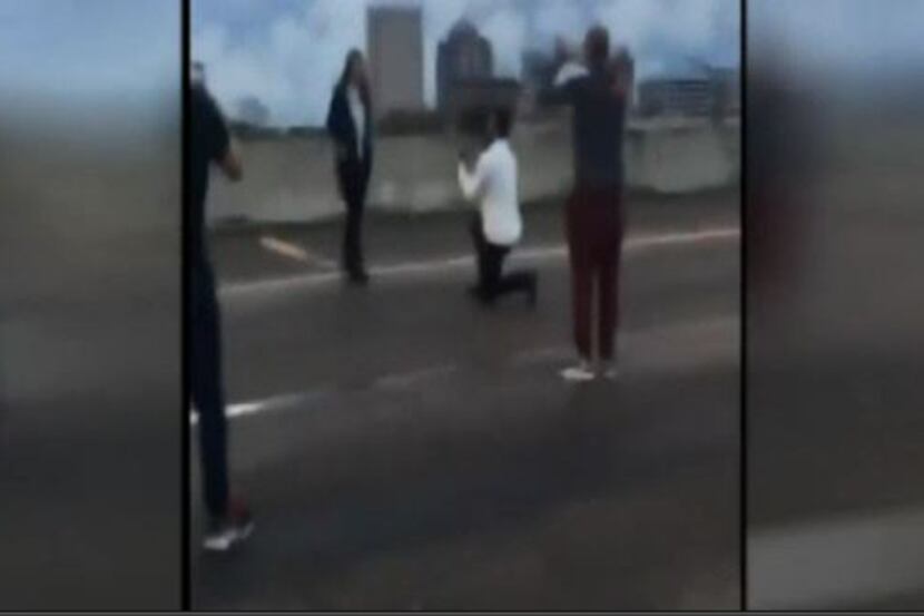 Vidal Valladares proposed in the middle of Interstate 45 near downtown Houston in December.