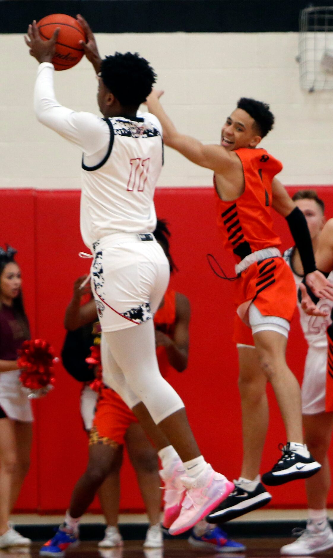 Mesquite Horn's Zaakir Saywer (11) pulls down a defensive rebound over Rockwall's Logan...