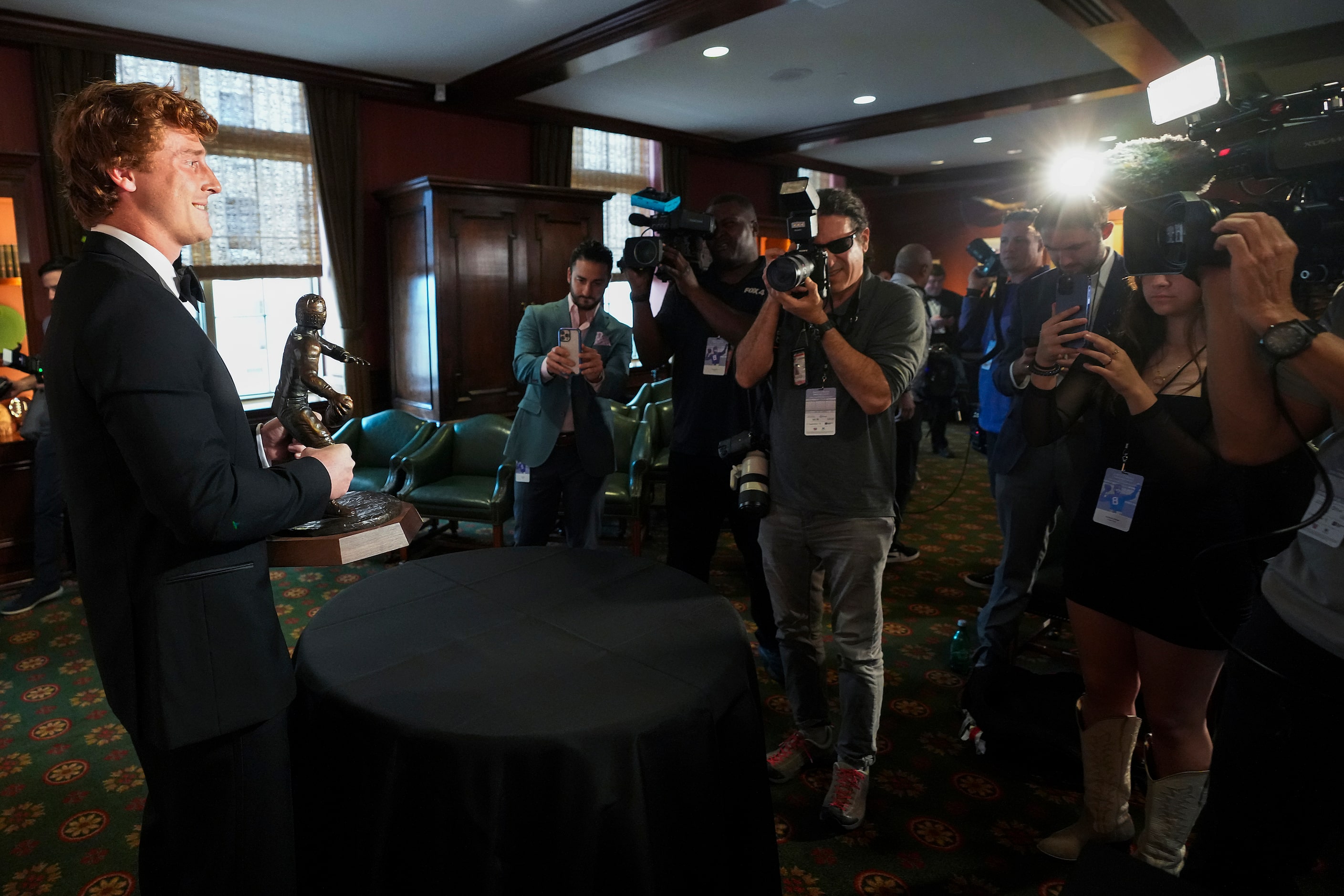 TCU quarterback Max Duggan holds the Davey O'Brien Award, given to College Football’s best...