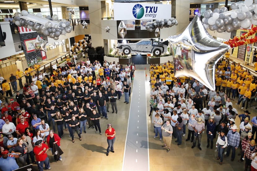 TXU Energy, whose employees are seen at a 2015 rally, was expected to be hit hard by...
