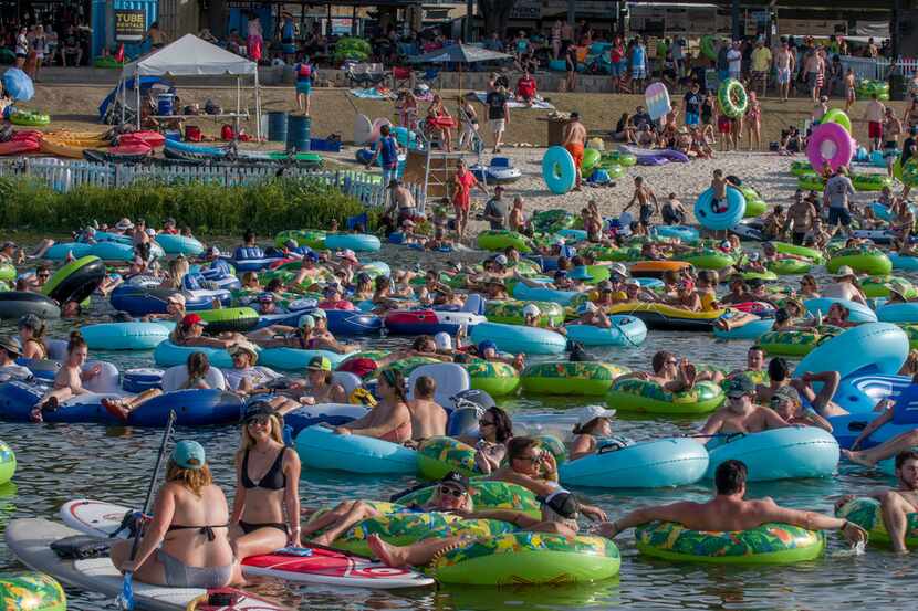 The Trinity River on the cusp of downtown Fort Worth is packed with tubers during Rockin'...