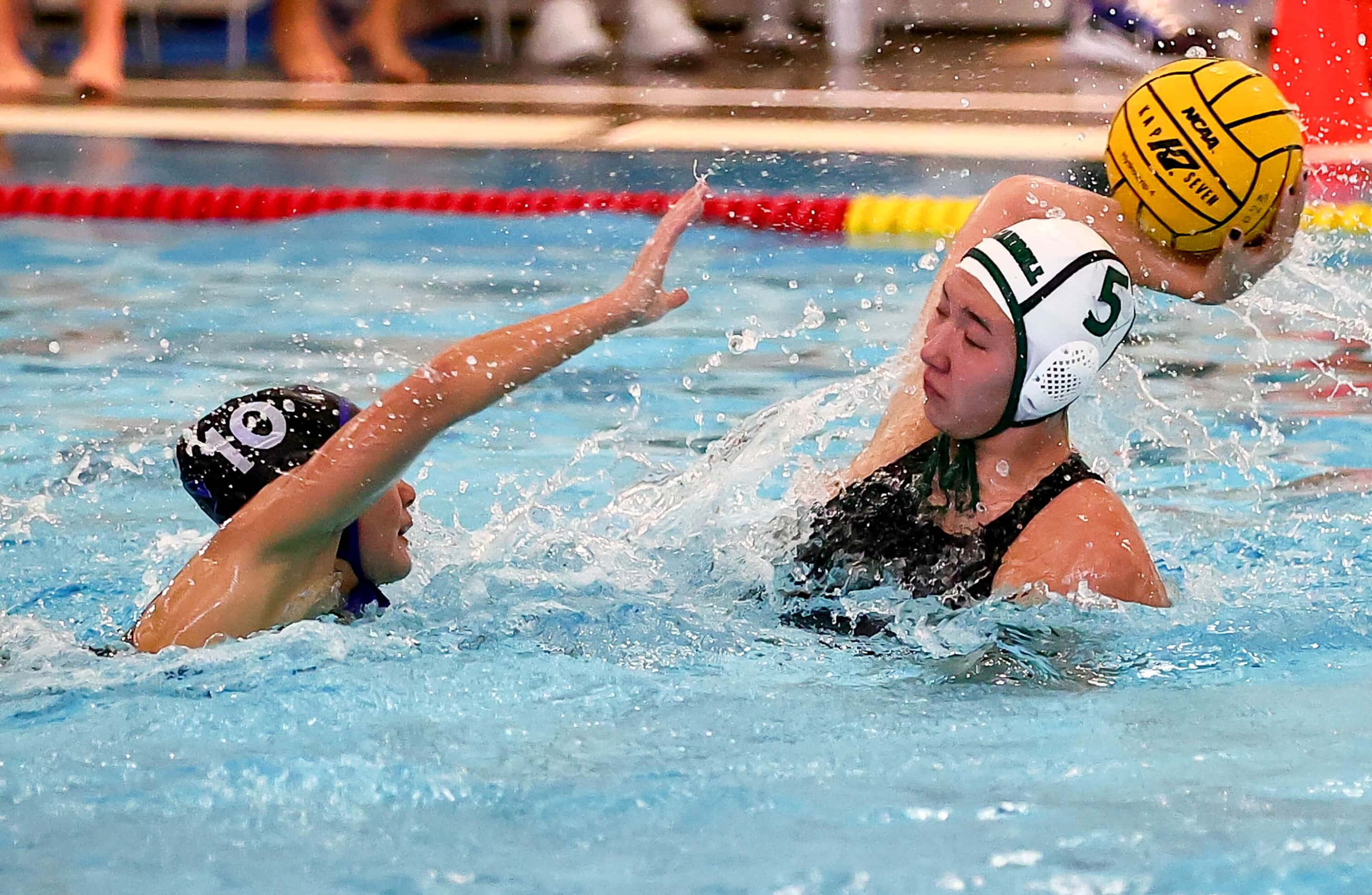 Southlake Carroll's Chloe Criswell (5) attempts a shot against Hebron's Mollie Cho (10) in...