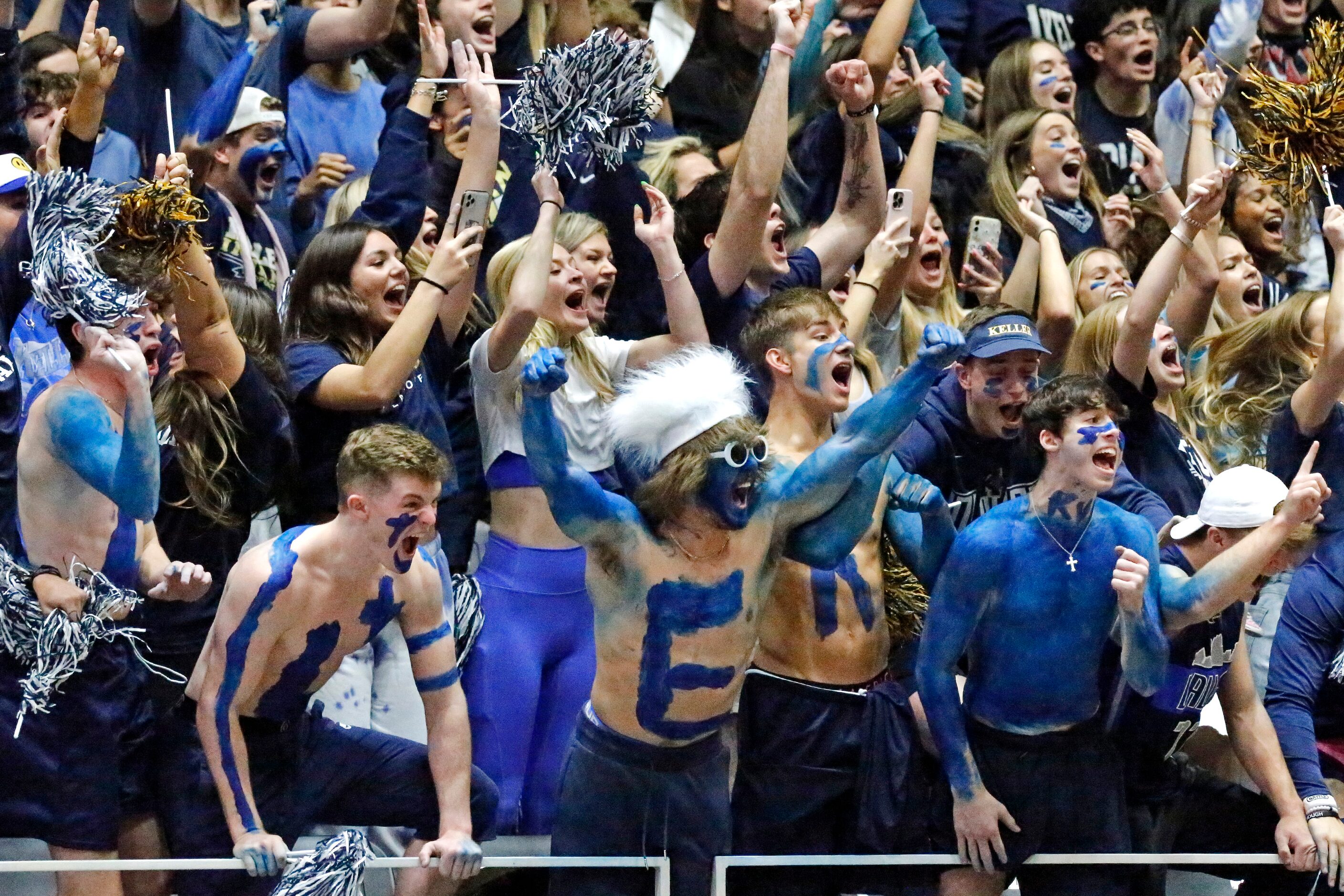 The Keller High School student section cheers their team during game one as Keller High...