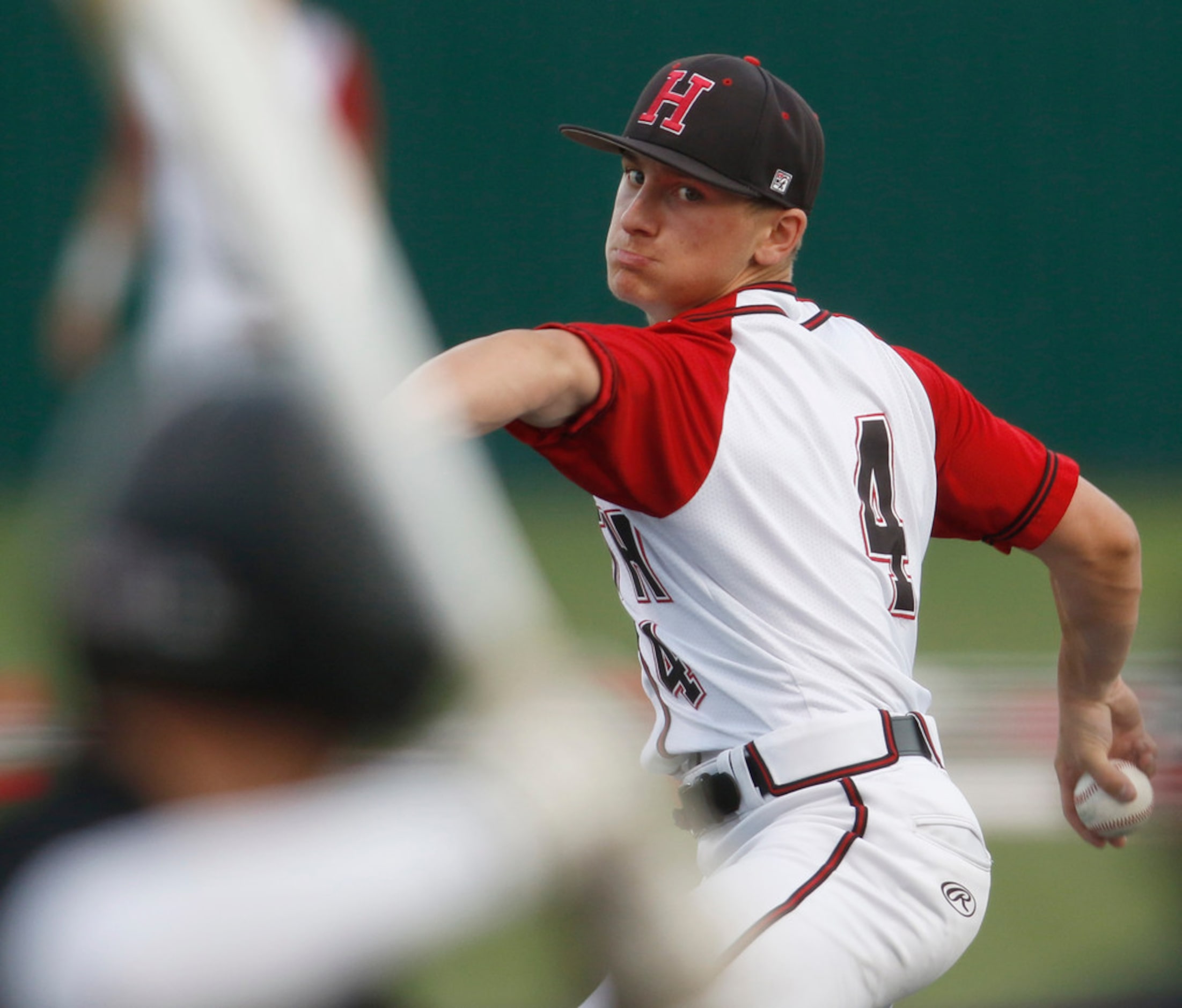 Rockwall Heath pitcher Jett Williams (4) delivers a pitch during the first inning of play...