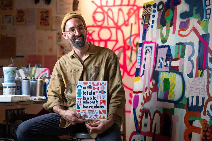 Artist Kyle Steed with his book, A Kids Book About Boredom, at his art studio in Dallas, on...