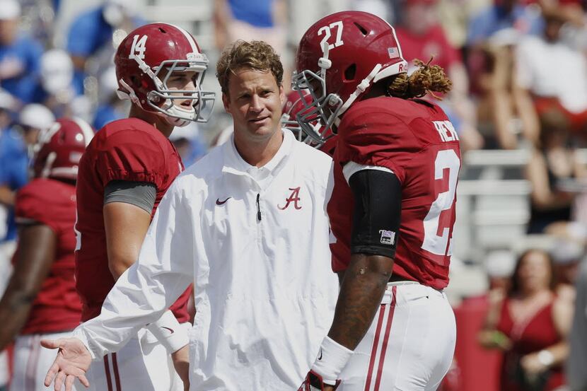 FILE - In this Sept. 20, 2014, file photo, Alabama offensive coordinator Lane Kiffin,...