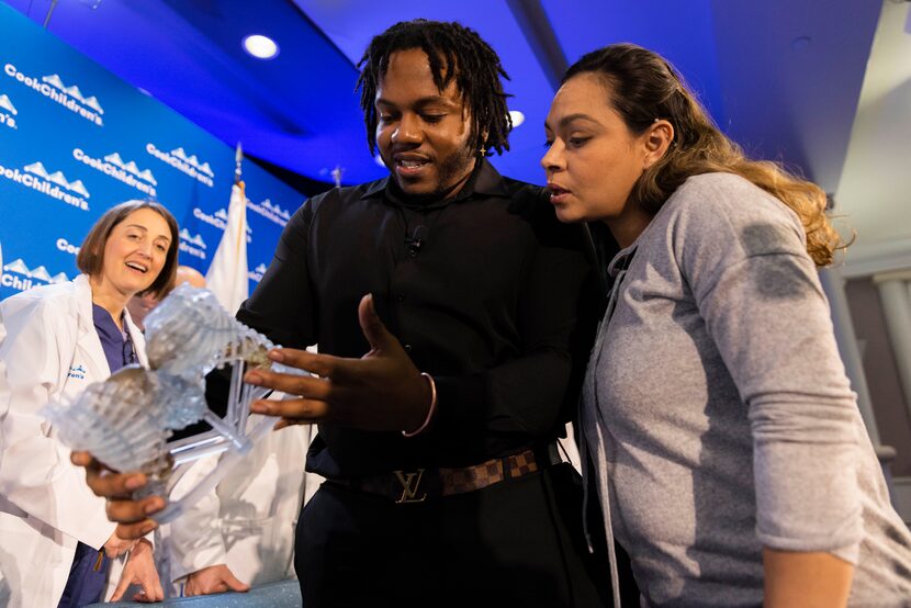 Amanda Arciniega (right) and James Finely, parents of 16-week-old girls, AmieLynn and...