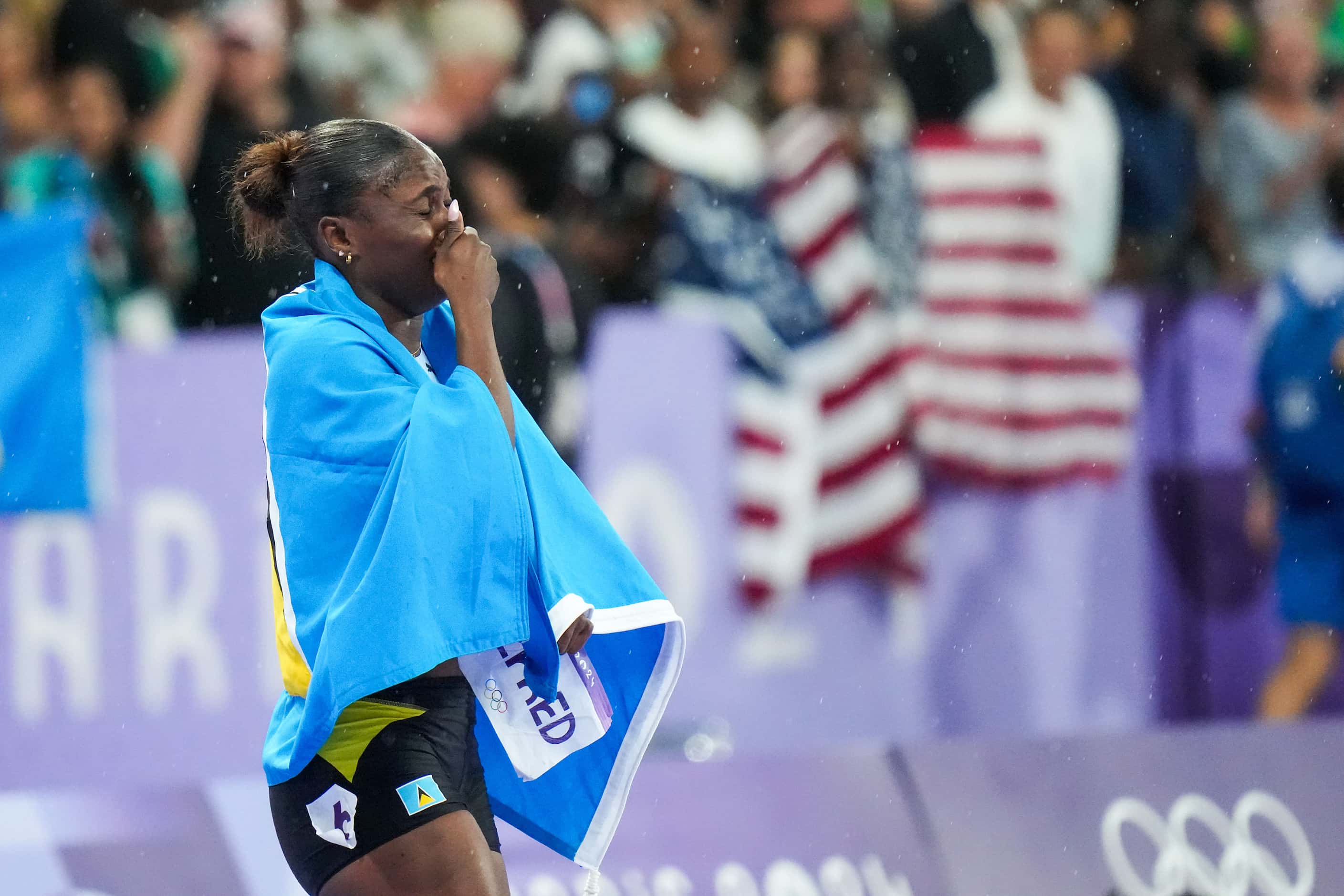 Julien Alfred of Saint Lucia reacts after winning the gold medal in the women’s 100-meters...