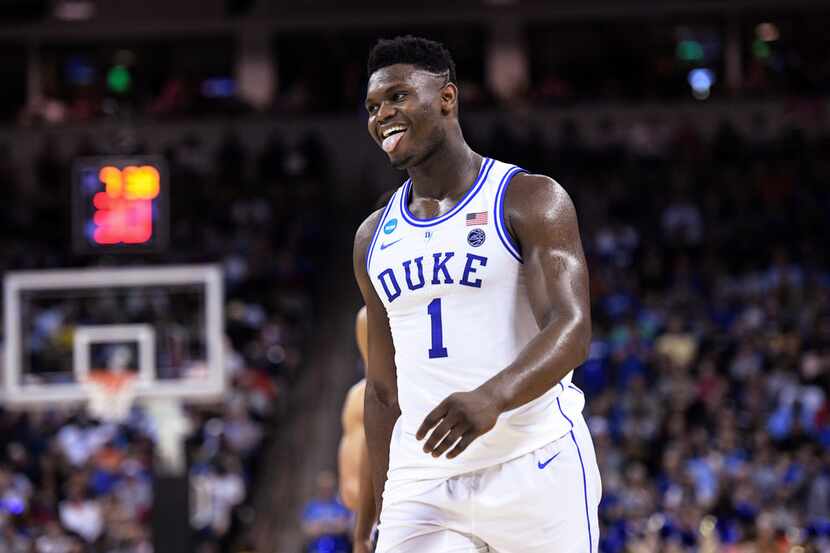 Duke forward Zion Williamson reacts after getting called for a foul against Central Florida...