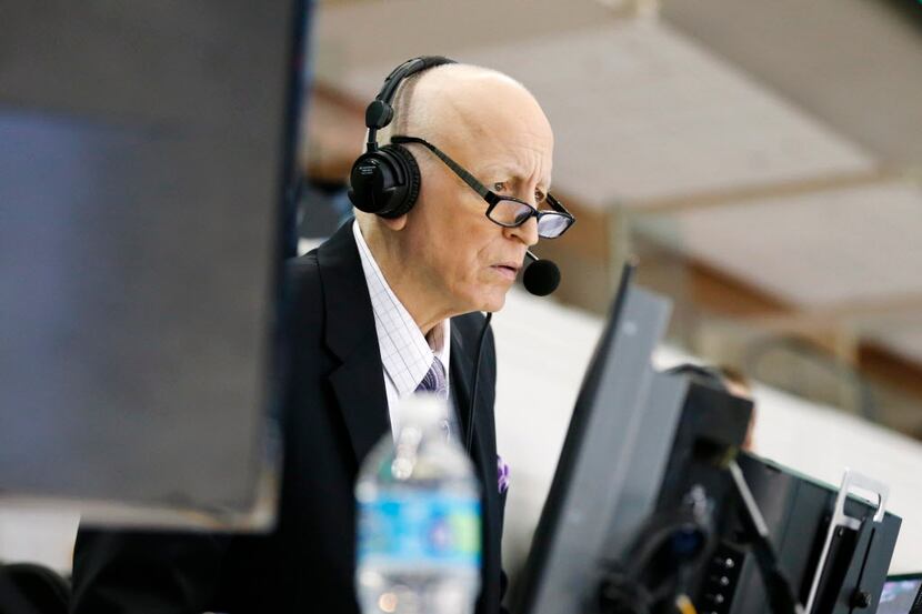 Dallas Stars play-by-play Dave Strader prepares before calling a game between the Dallas...