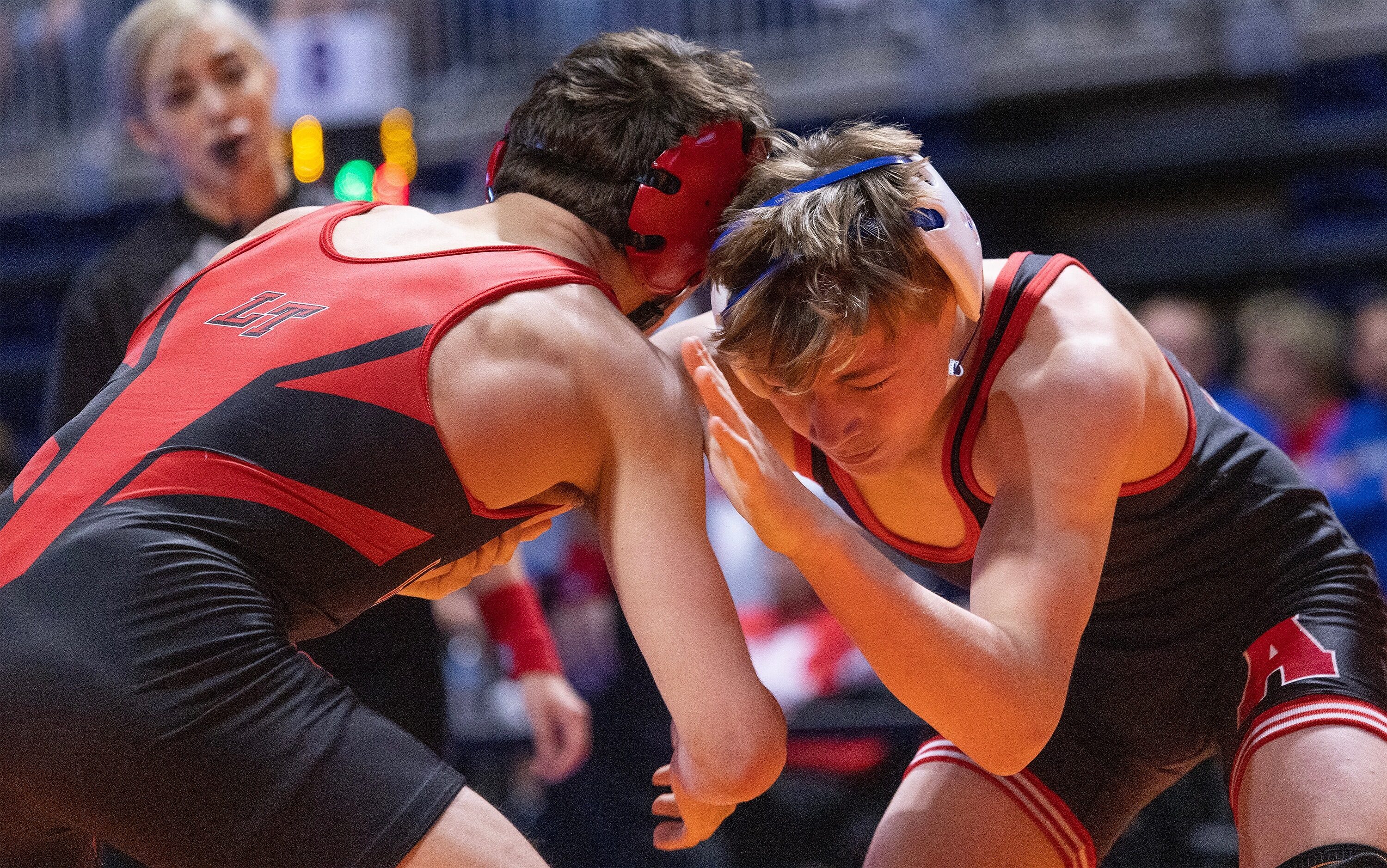 Joseph Liescheski from Allen (right) wrestles Will Deutschlander from Austin Lake Travis in...