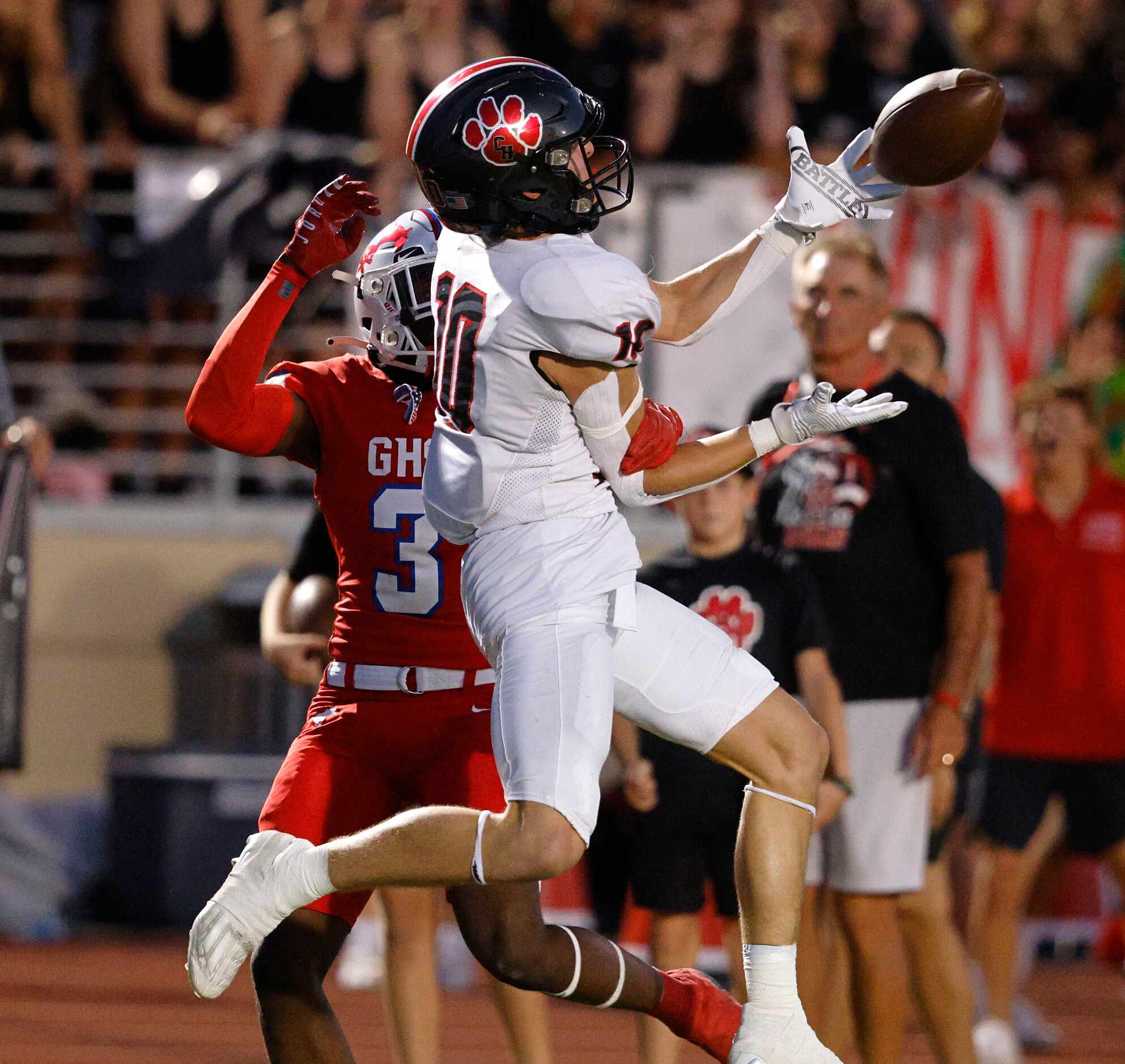 Colleyville Heritage's Kai Pruitt (10) fails to make the catch against Grapevine's Dereon...